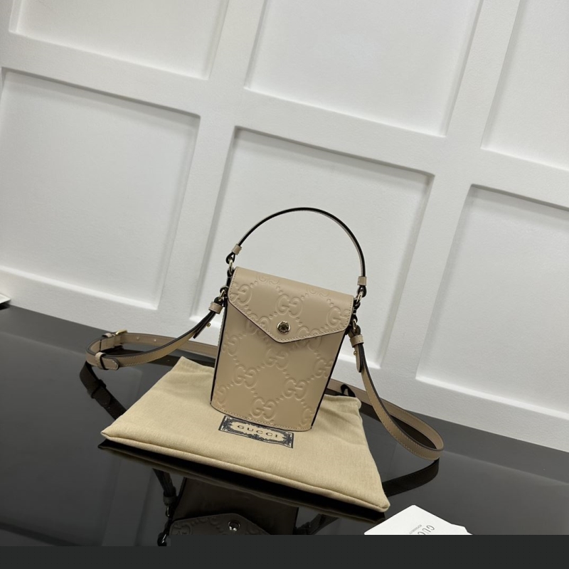 G*u*i top handle bags